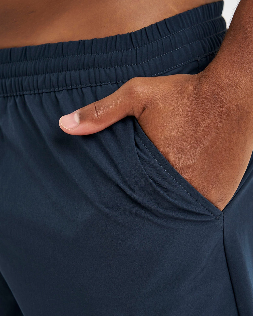 Model wearing Intensity 7" Performance Short - Carbon