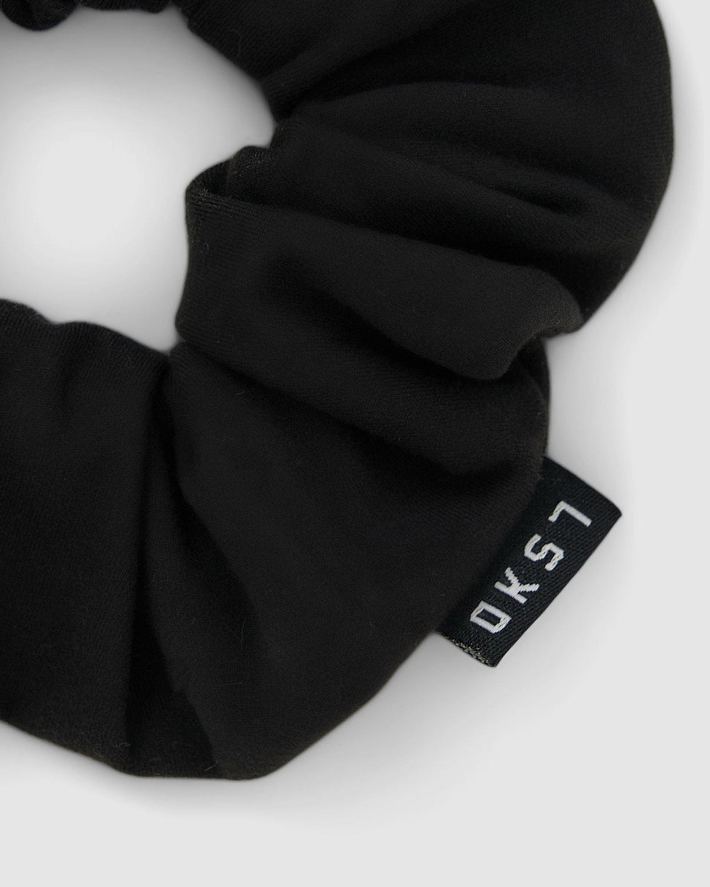 Model wearing Rep Scrunchie - Black