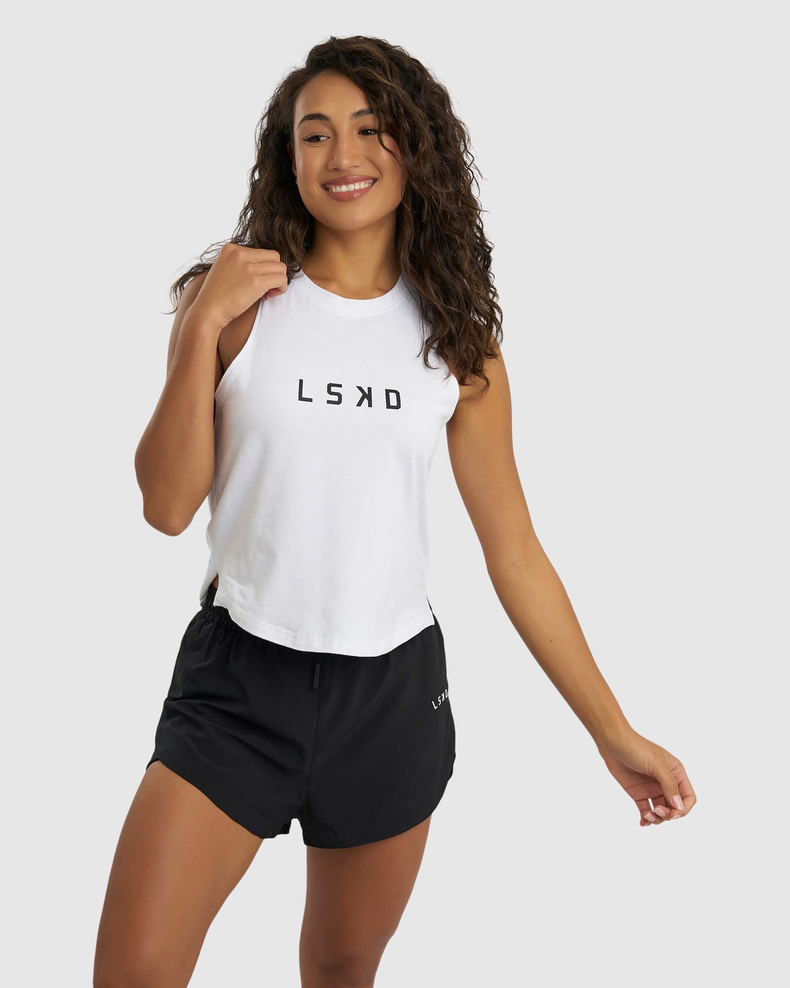 Model wearing Power FLXDRY Performance Tank - White