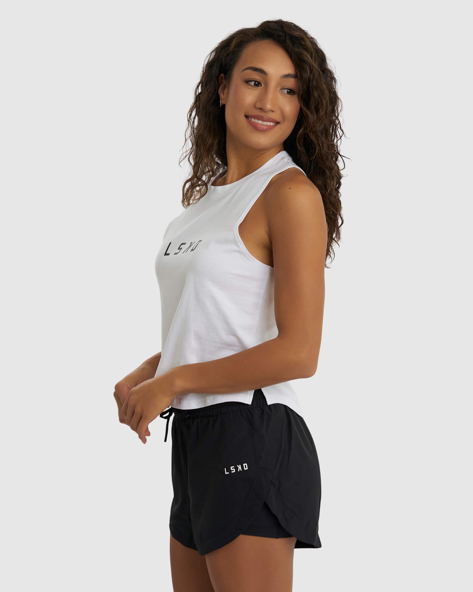 Model wearing Power FLXDRY Performance Tank - White