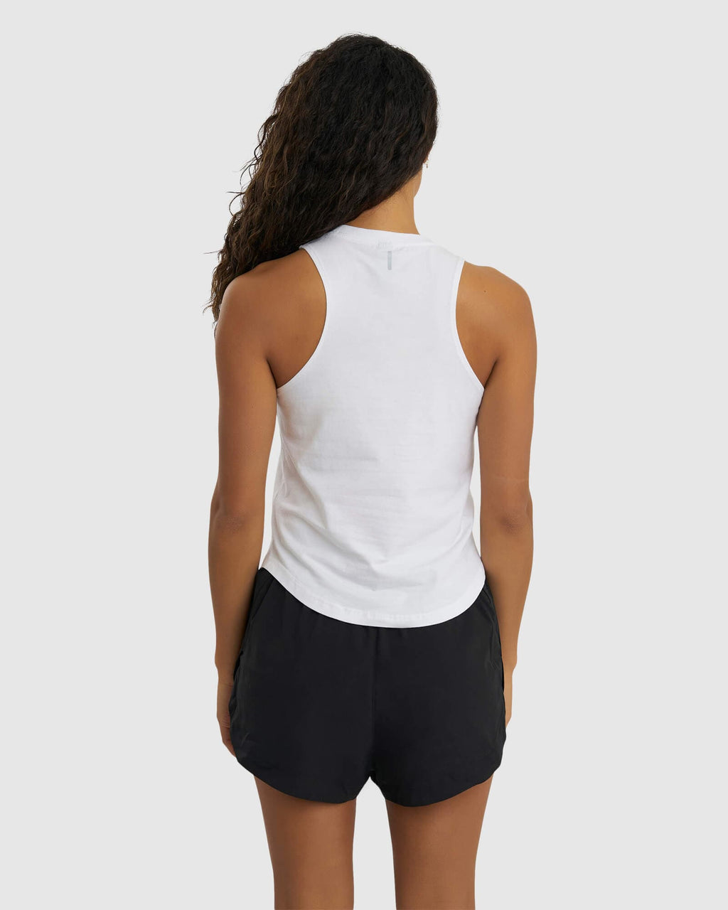 Model wearing Power FLXDRY Performance Tank - White