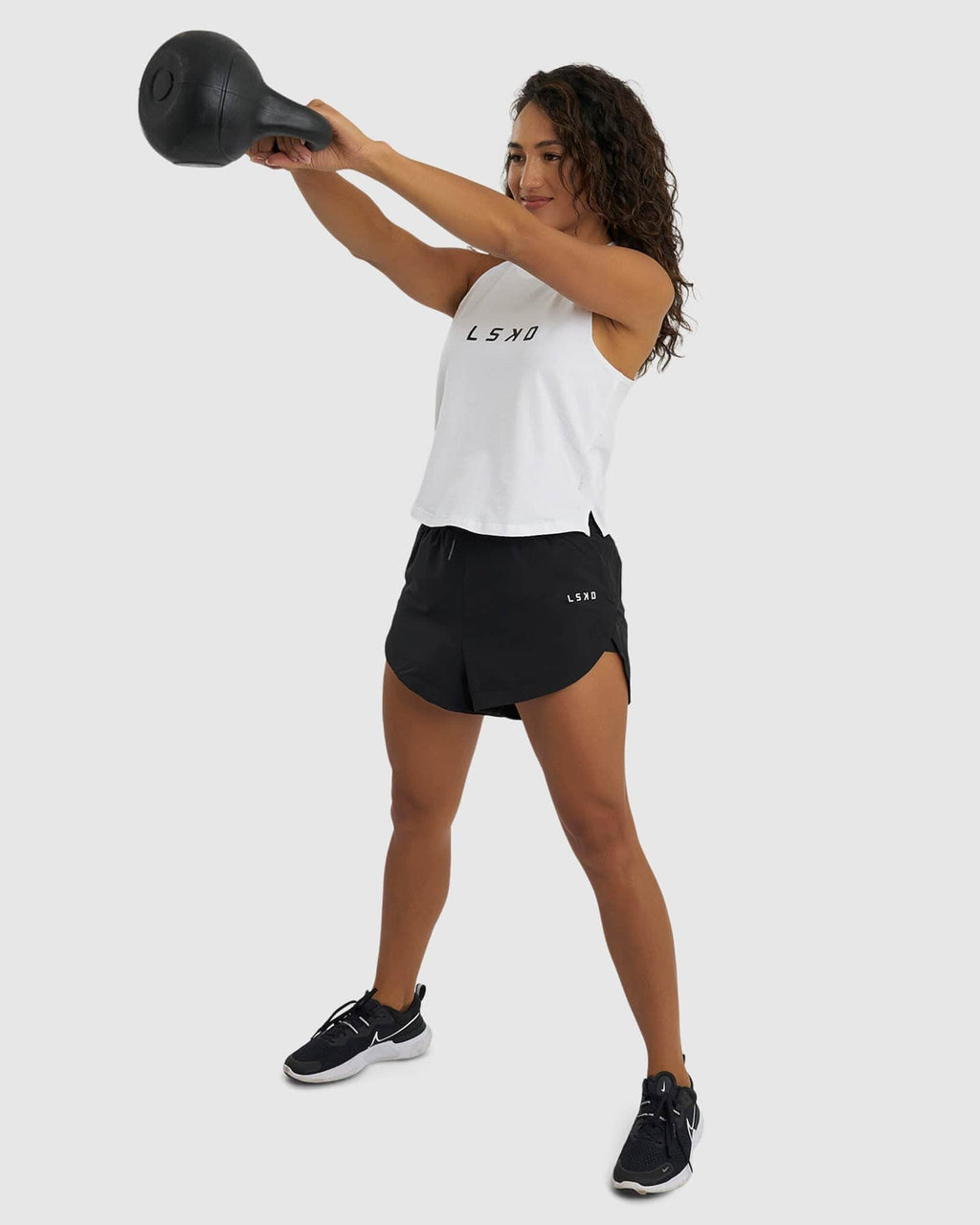 Model wearing Power FLXDRY Performance Tank - White