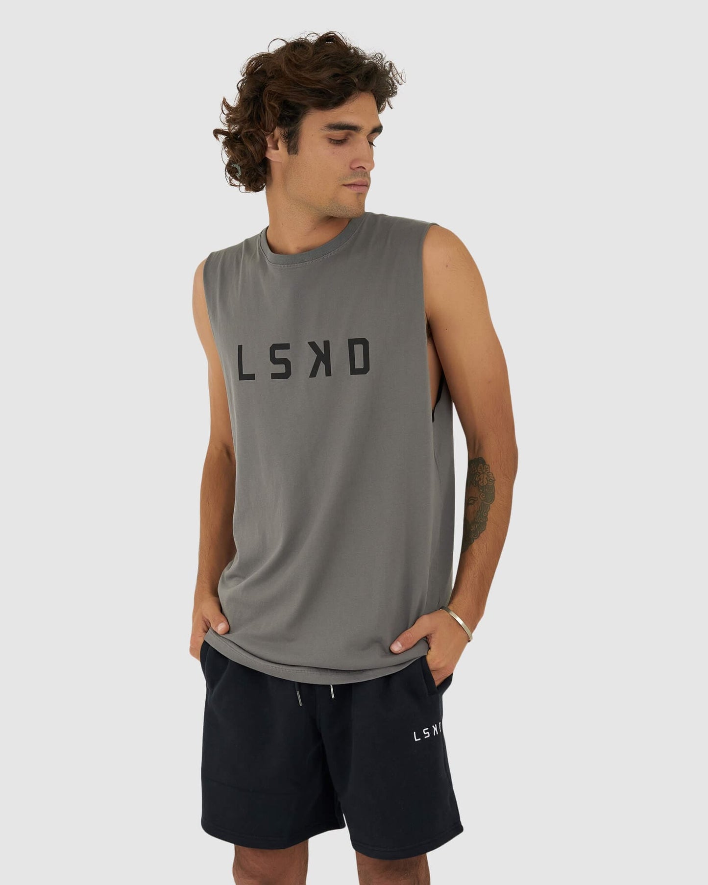 Model wearing Structure Tank - Castlerock