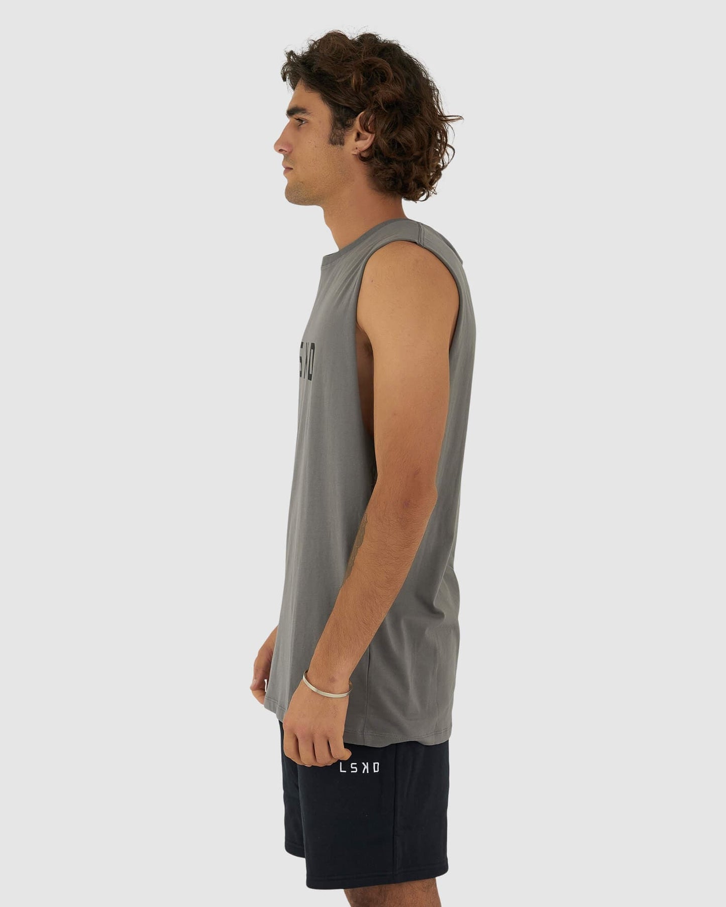 Model wearing Structure Tank - Castlerock