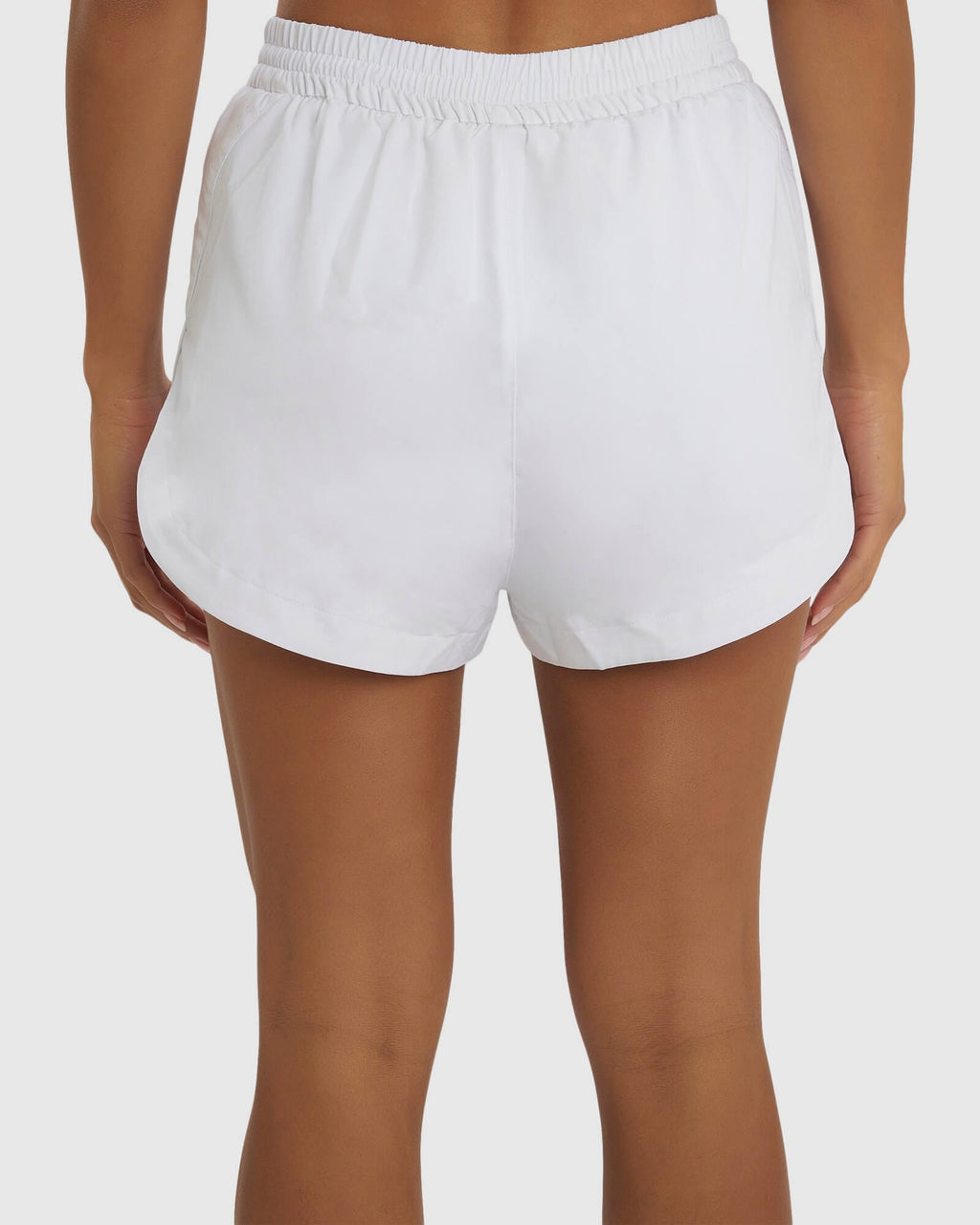 Model wearing Power Performance Liner Short - White