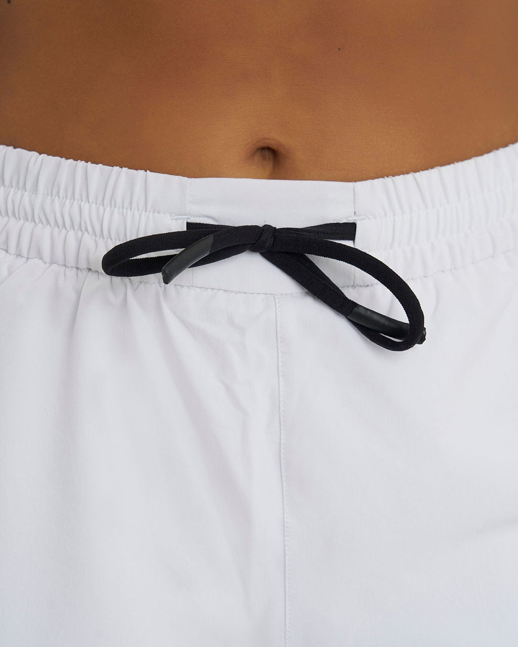 Model wearing Power Performance Liner Short - White