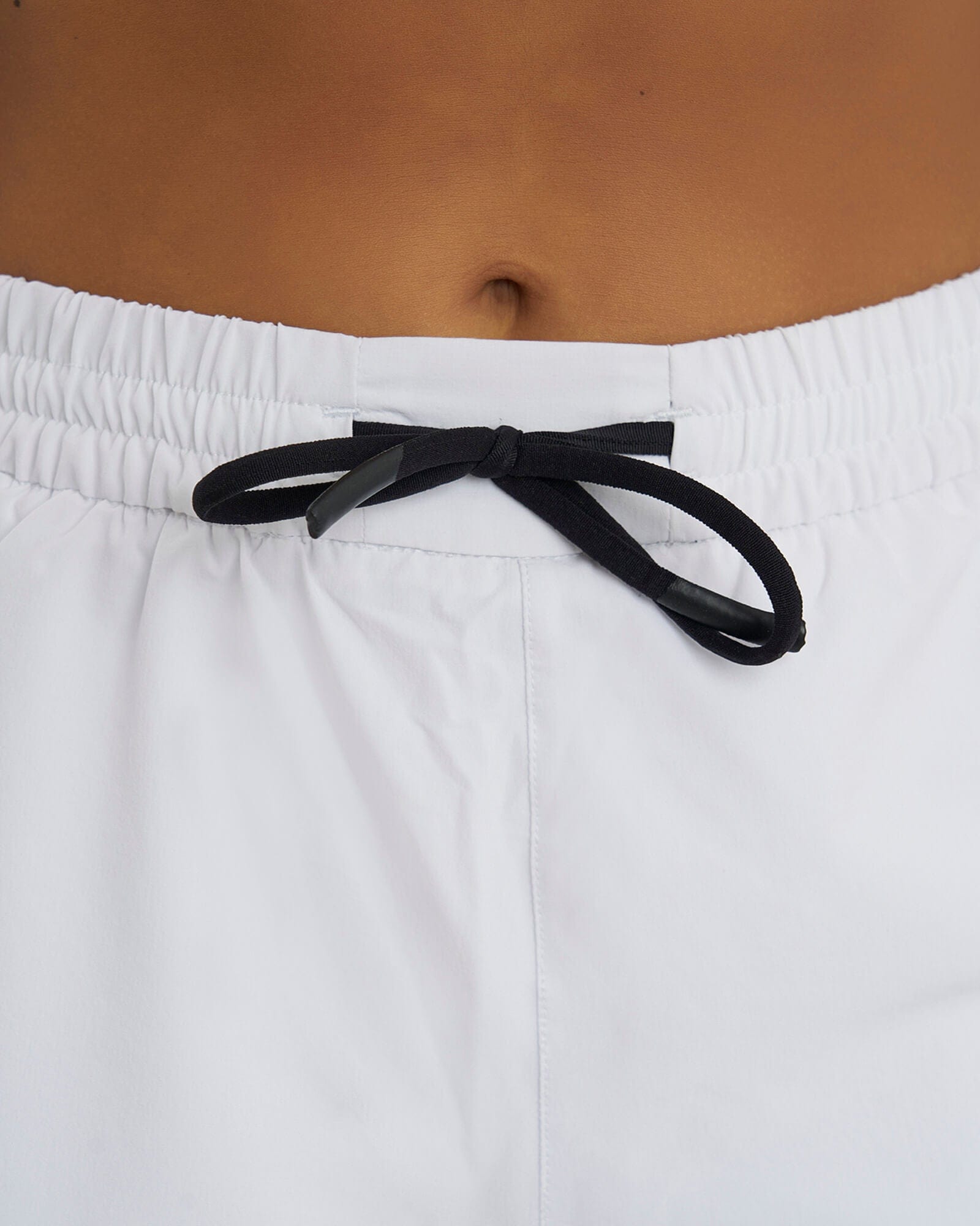 Model wearing Power Performance Liner Short - White