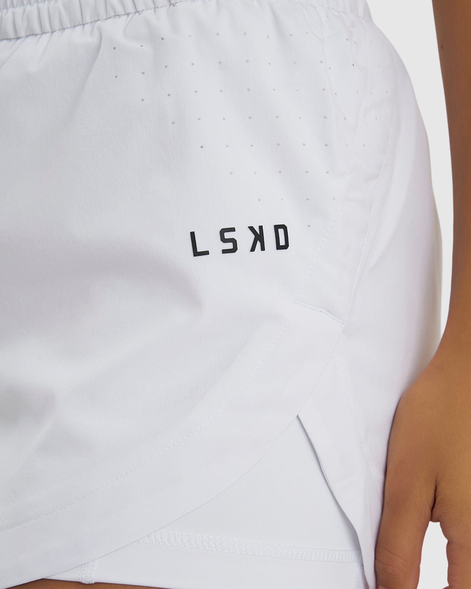 Model wearing Power Performance Liner Short - White