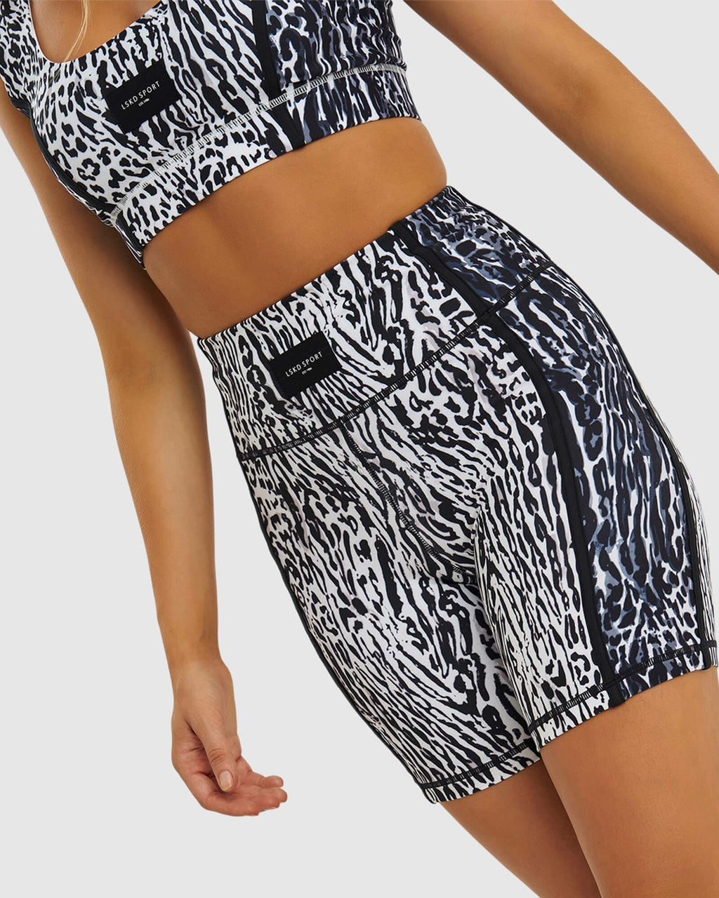 Model wearing Hunter Mid Short Tight - Snow Leopard