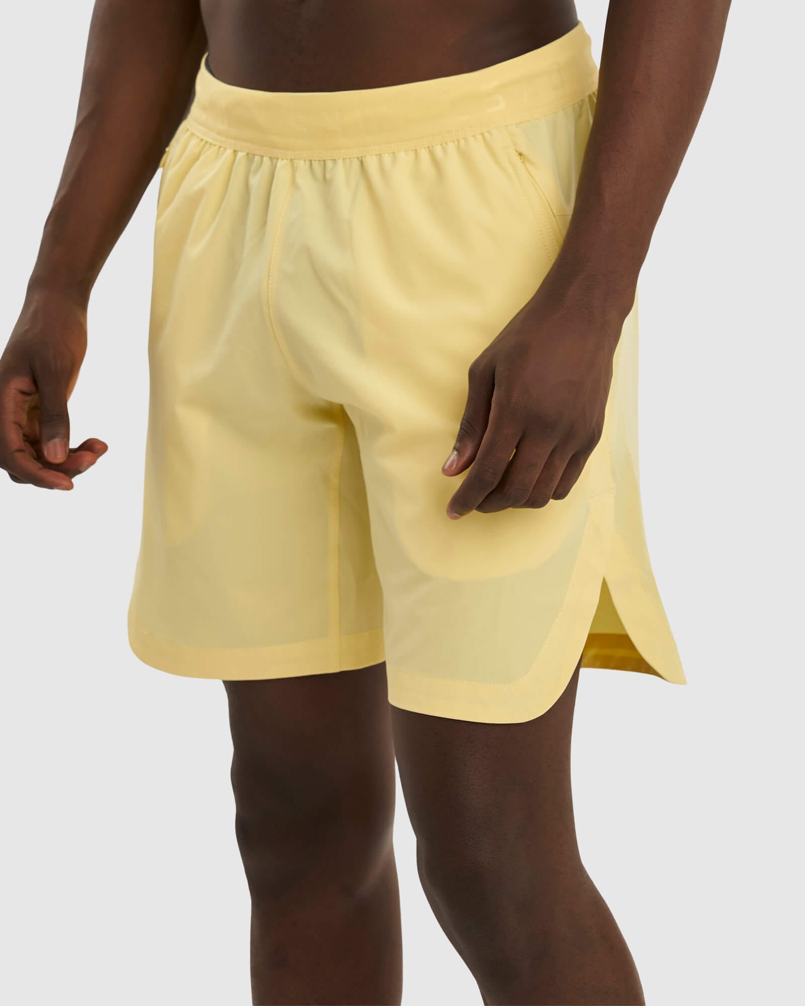 Model wearing Competition 8" Performance Short - Banana Smoothie