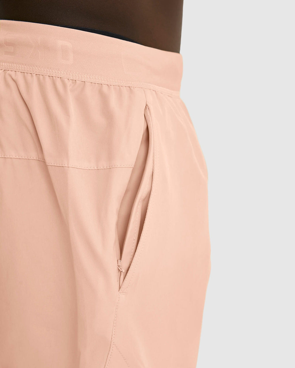 Model wearing Competition 8" Performance Short - Pink