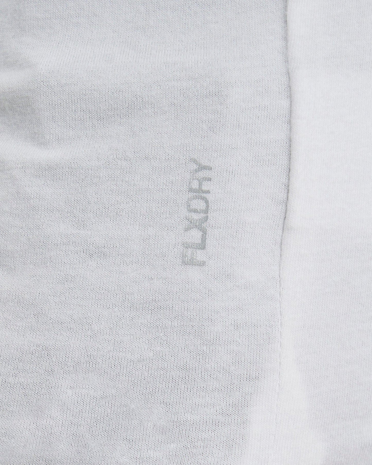 Model wearing Power FLXDRY Performance LS Tee - White