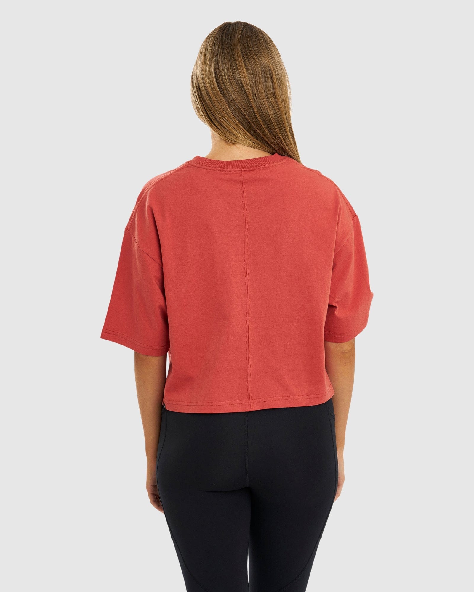 Model wearing Bella Tee - Hot Tamale