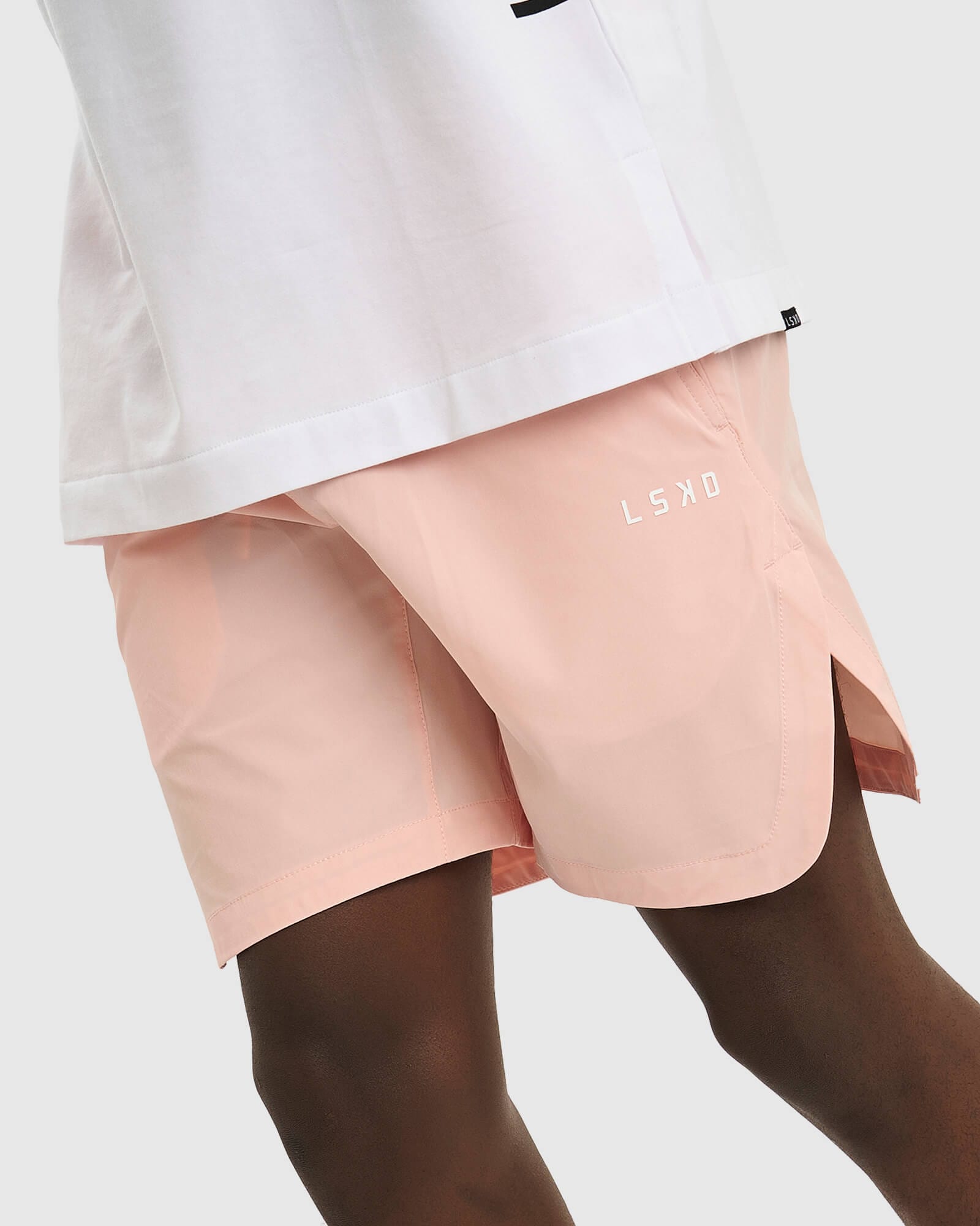 Model wearing Competition 8" Performance Short - Pink