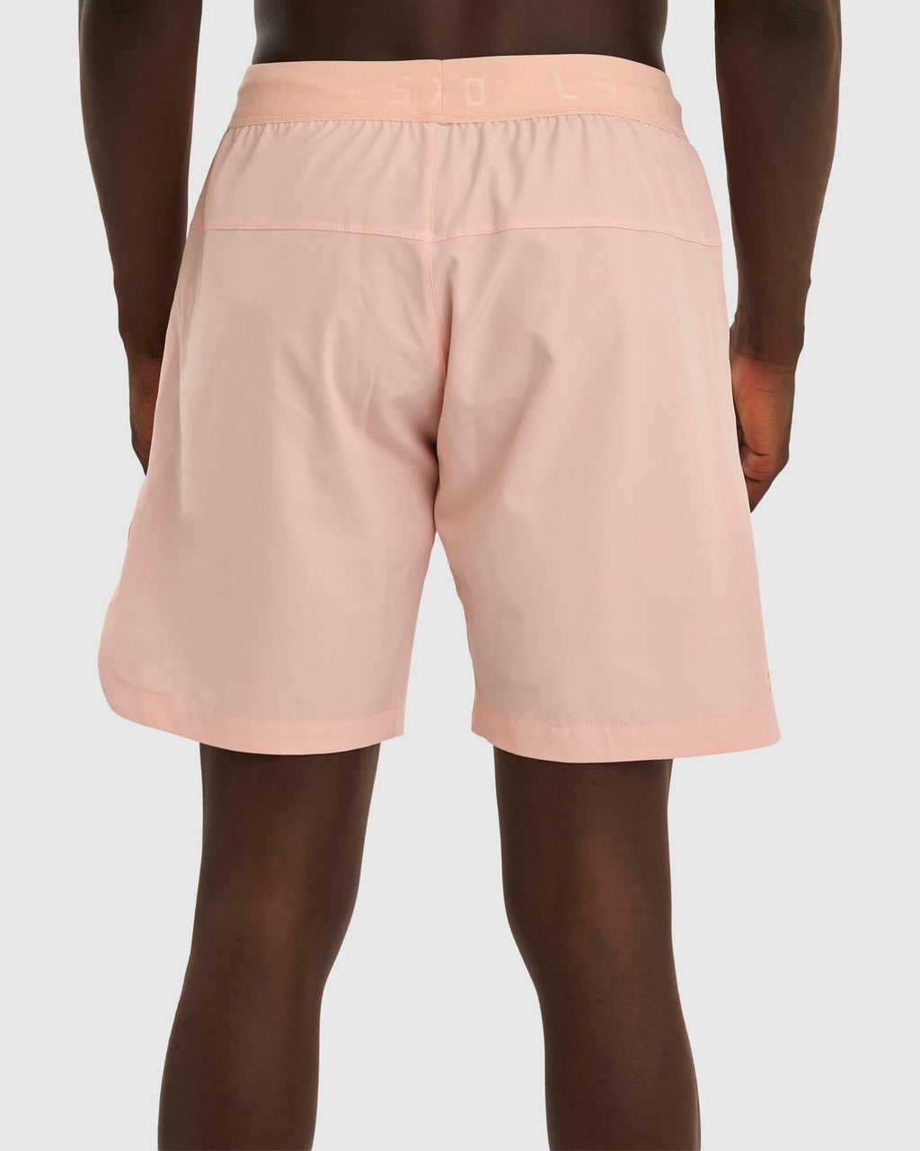 Model wearing Competition 8" Performance Short - Pink