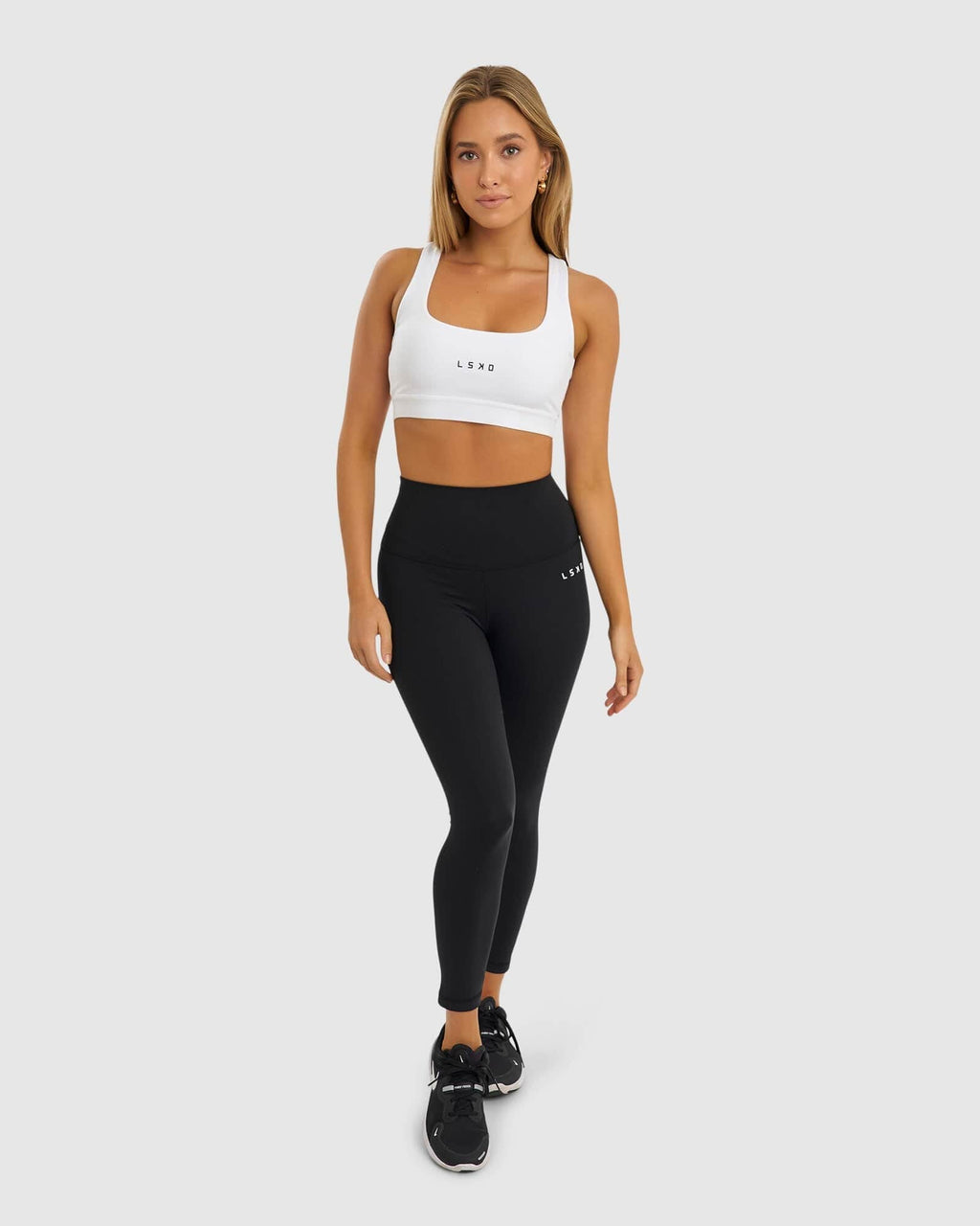 Model wearing Marker Sports Bra - White