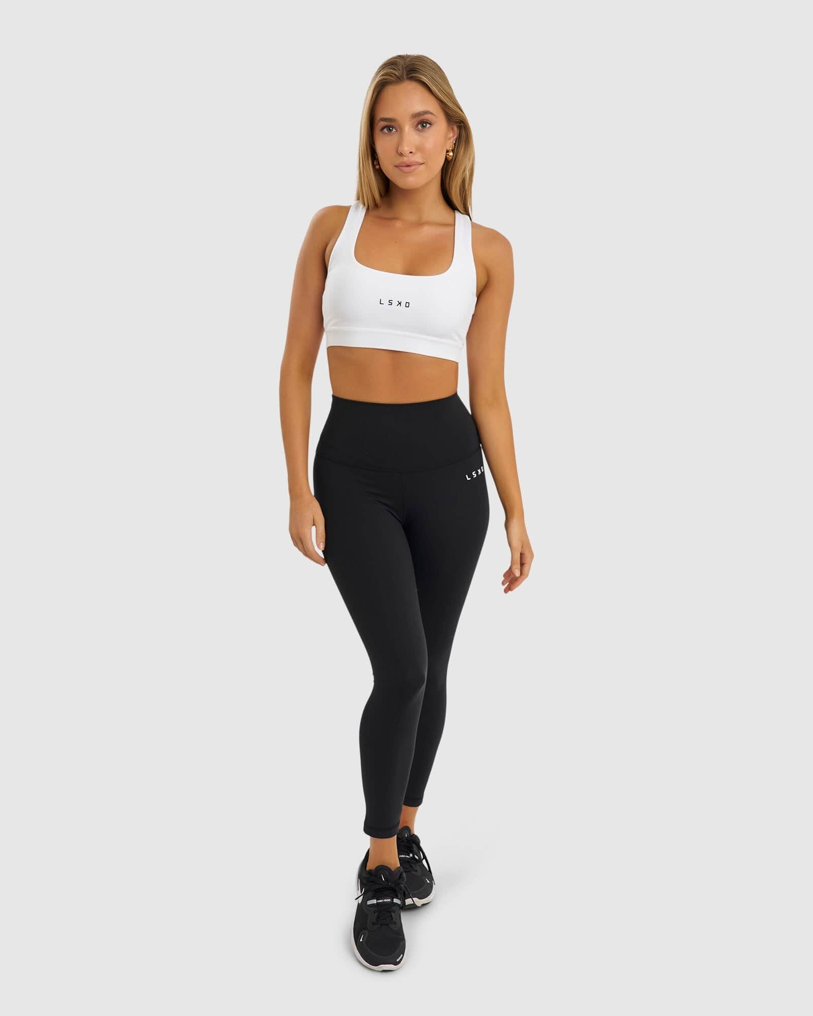 Model wearing Marker Sports Bra - White