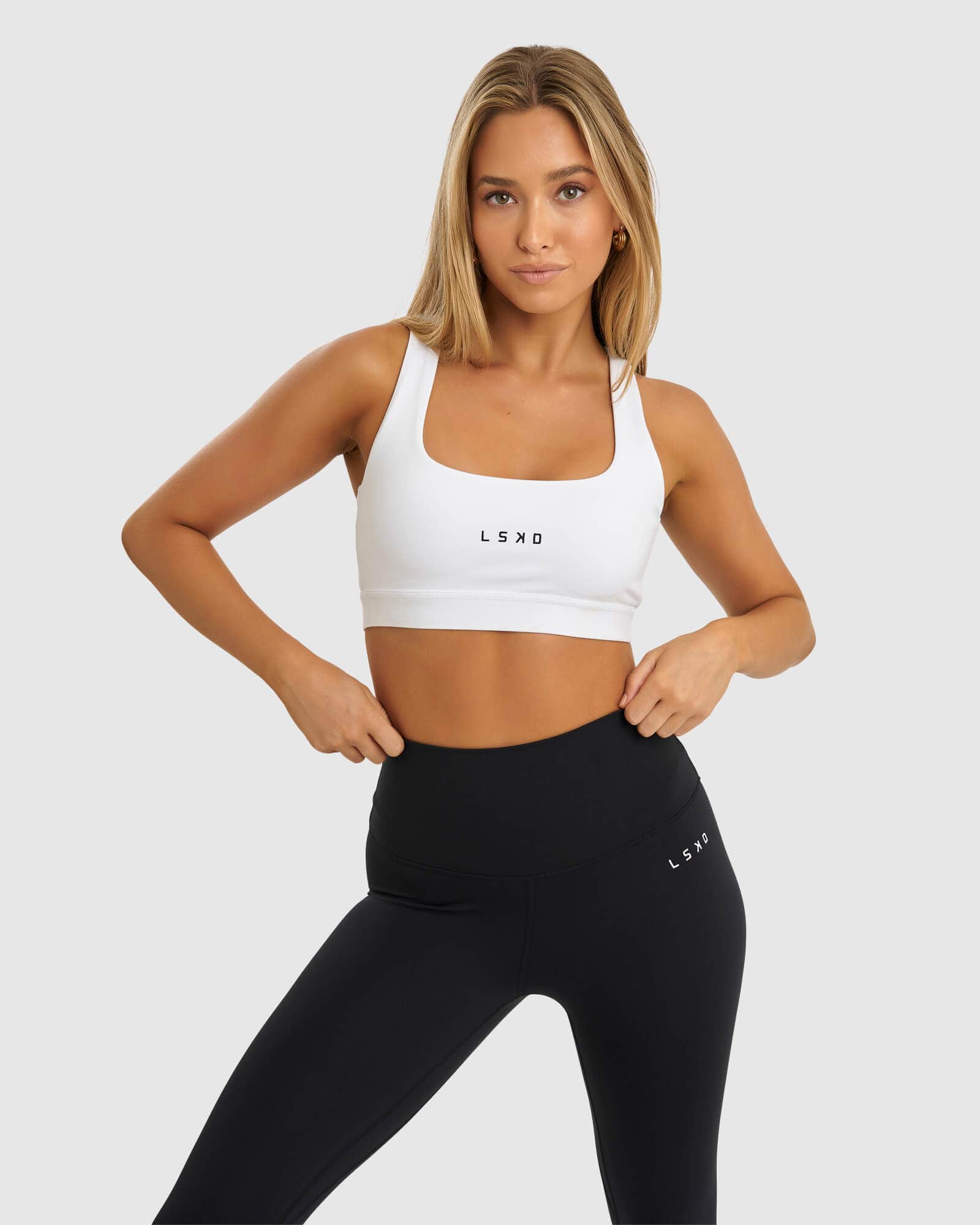 Model wearing Marker Sports Bra - White
