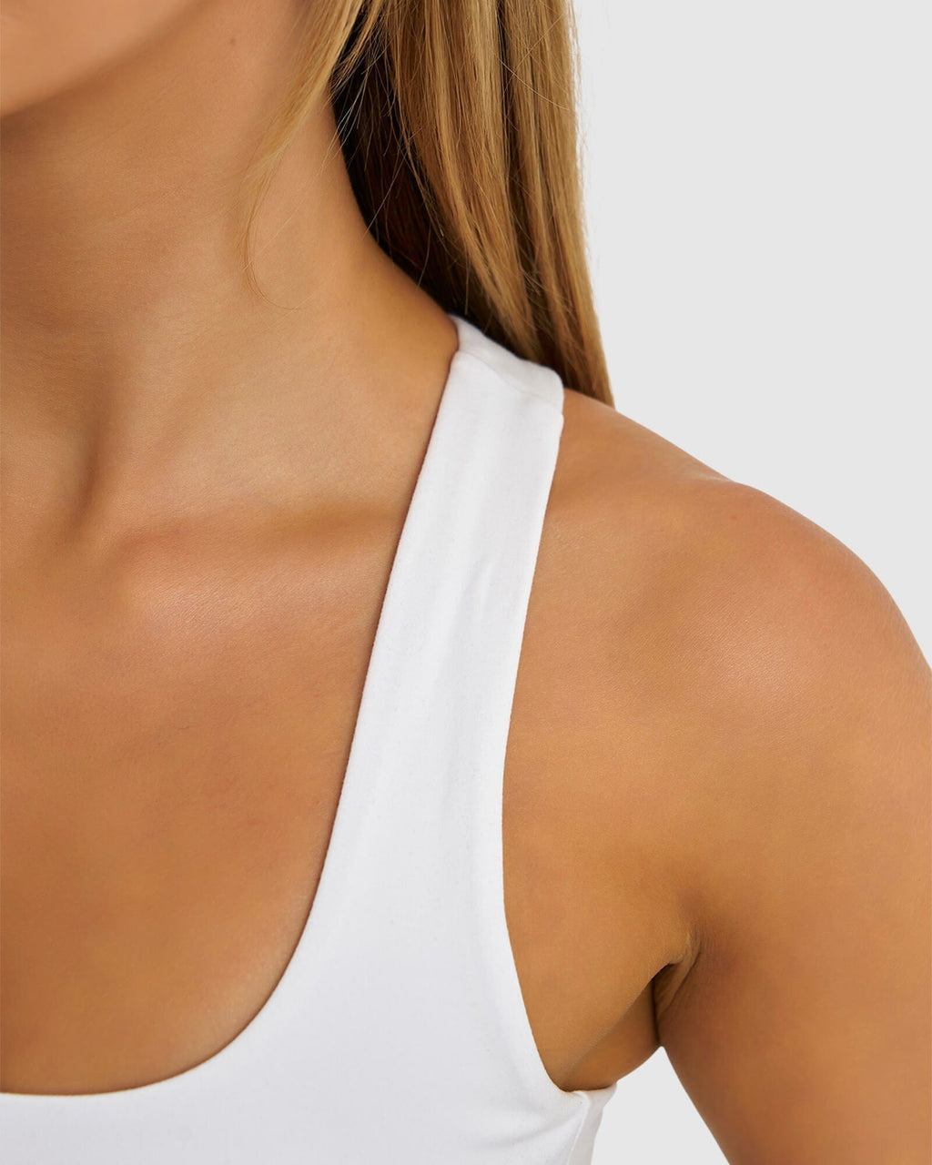 Model wearing Marker Sports Bra - White