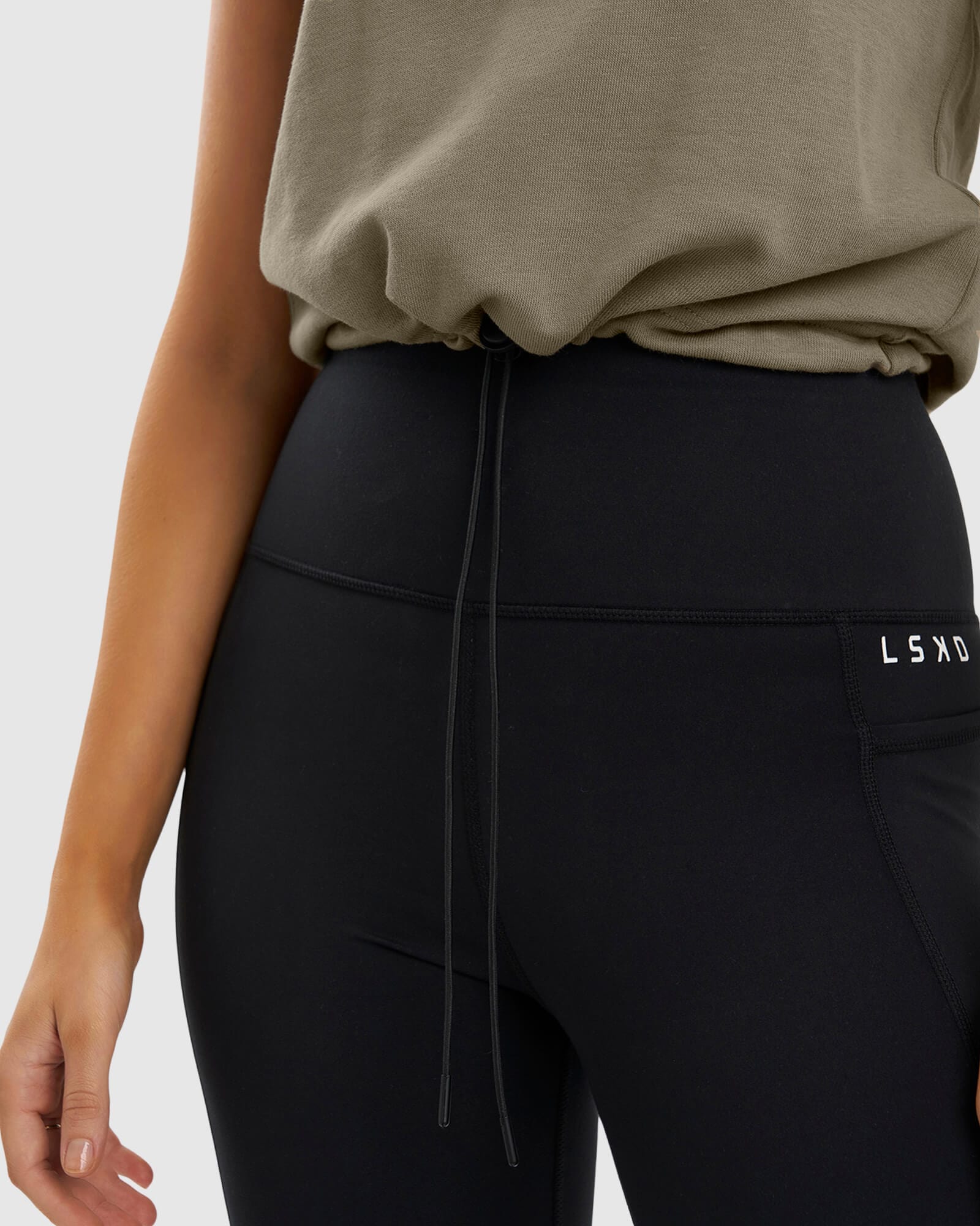 Model wearing Blair Pull Tank - Laurel Oak