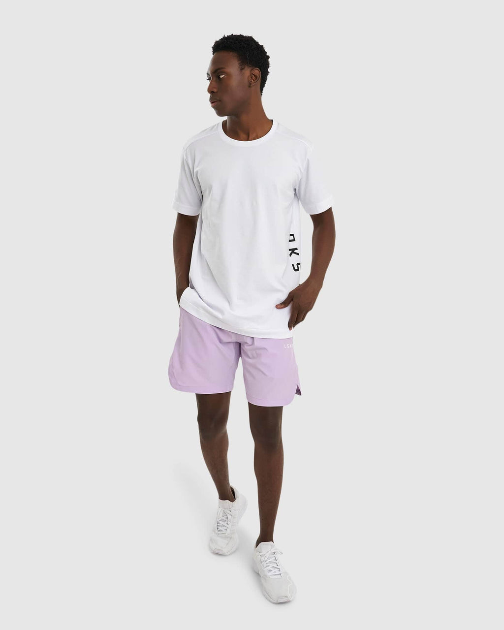 Model wearing Competition 8" Performance Short - Pastel Lilac