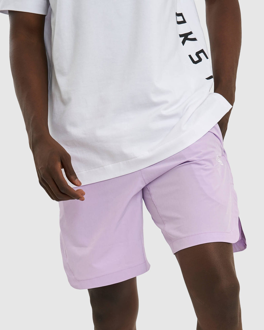 Model wearing Competition 8" Performance Short - Pastel Lilac