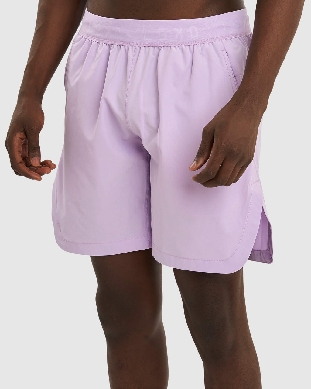 Model wearing Competition 8" Performance Short - Pastel Lilac