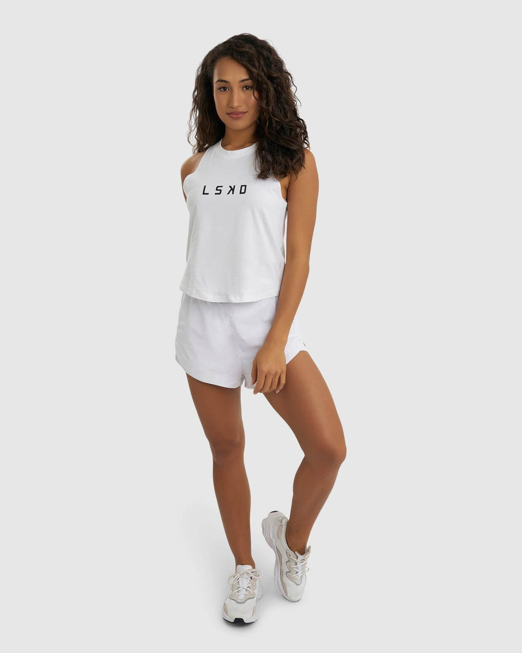 Model wearing Power Performance Liner Short - White