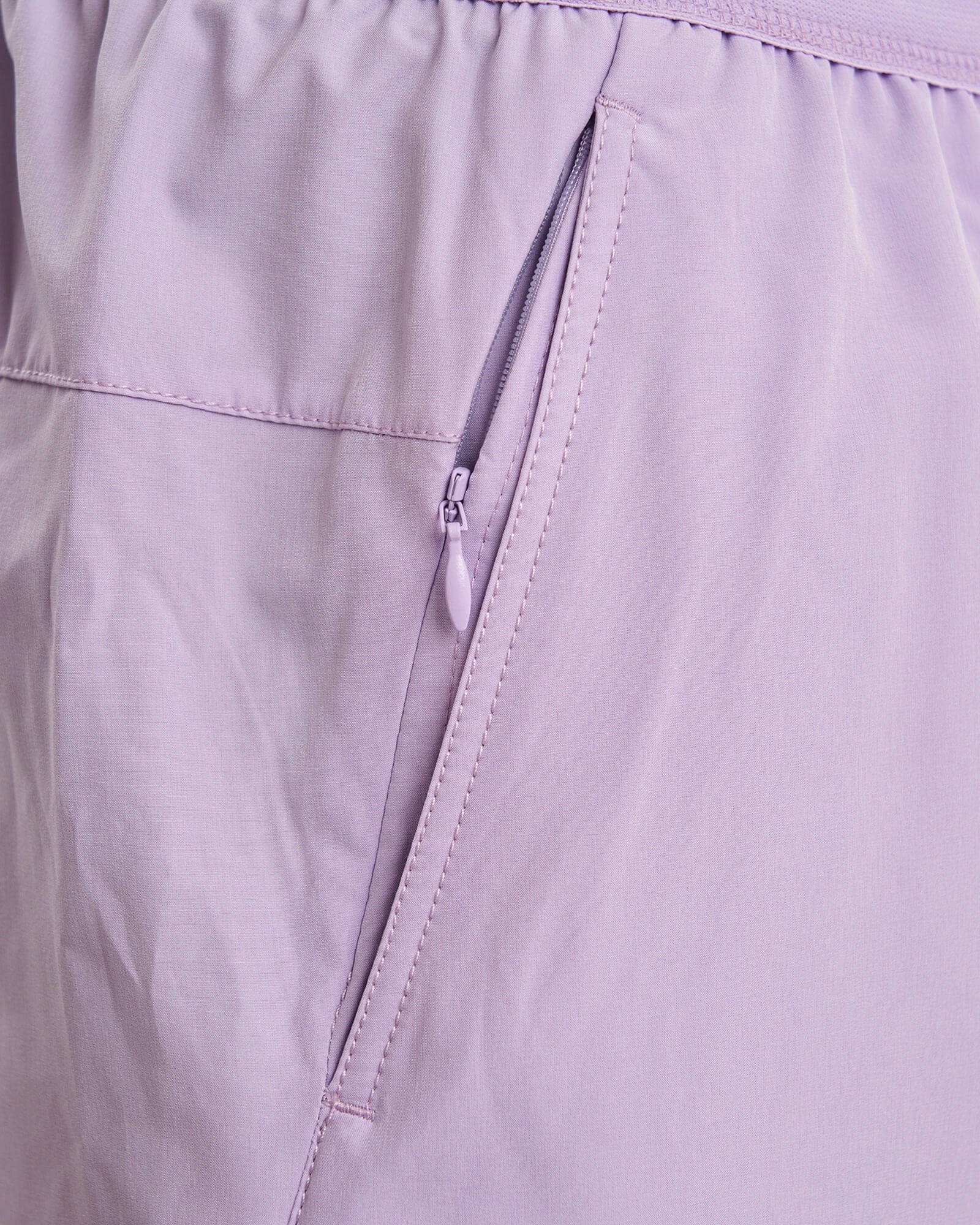Model wearing Competition 8" Performance Short - Pastel Lilac