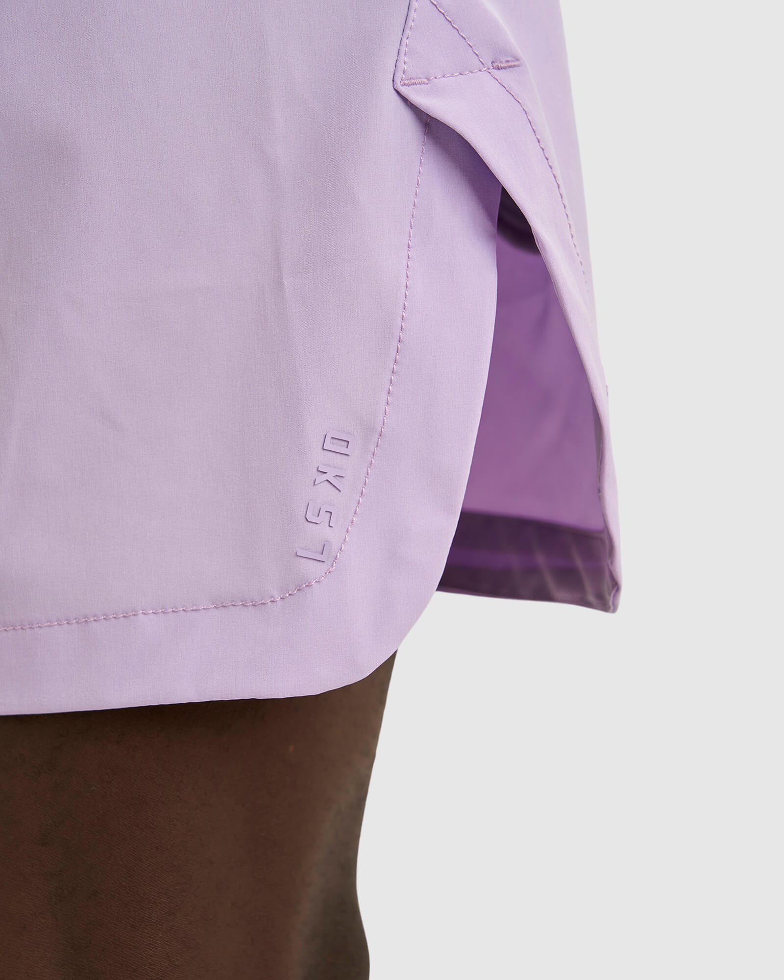 Model wearing Competition 8" Performance Short - Pastel Lilac