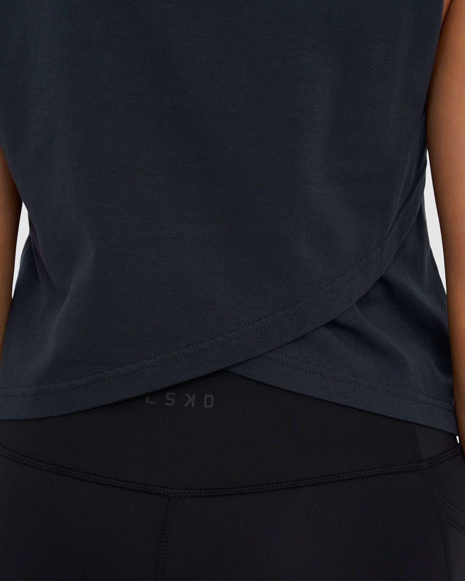 Model wearing Crossover Tank - Carbon
