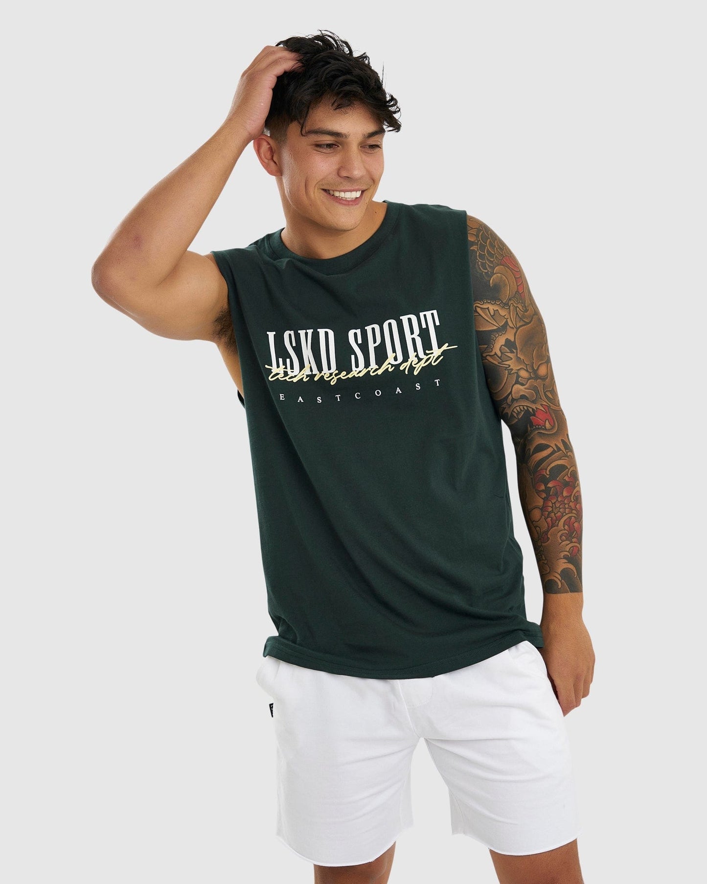 Model wearing Faculty Tank Vintage Fit - Vital Green
