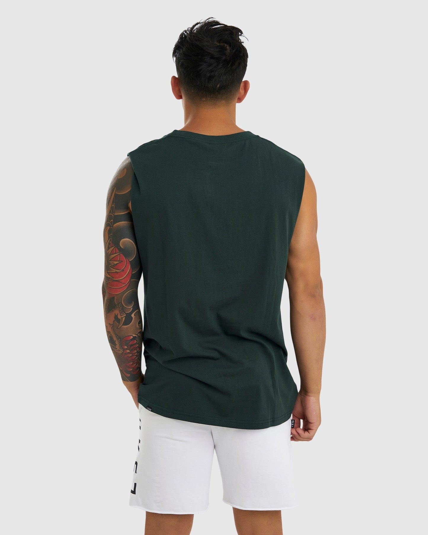 Model wearing Faculty Tank Vintage Fit - Vital Green