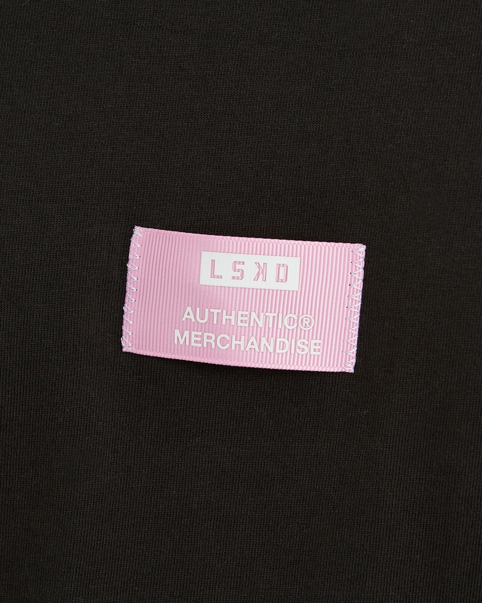 Model wearing Merch Tank Vintage Fit - Pirate Black