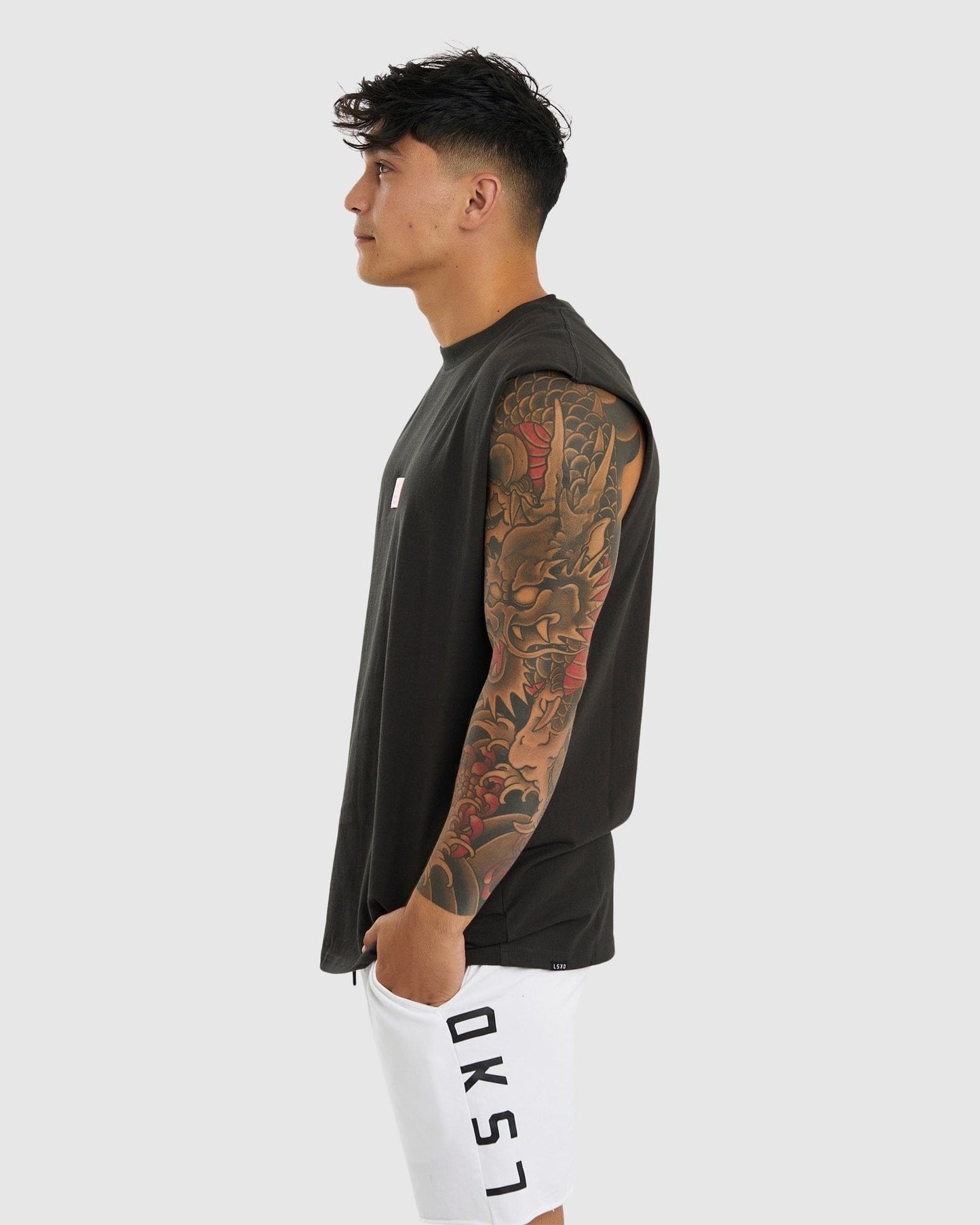 Model wearing Merch Tank Vintage Fit - Pirate Black