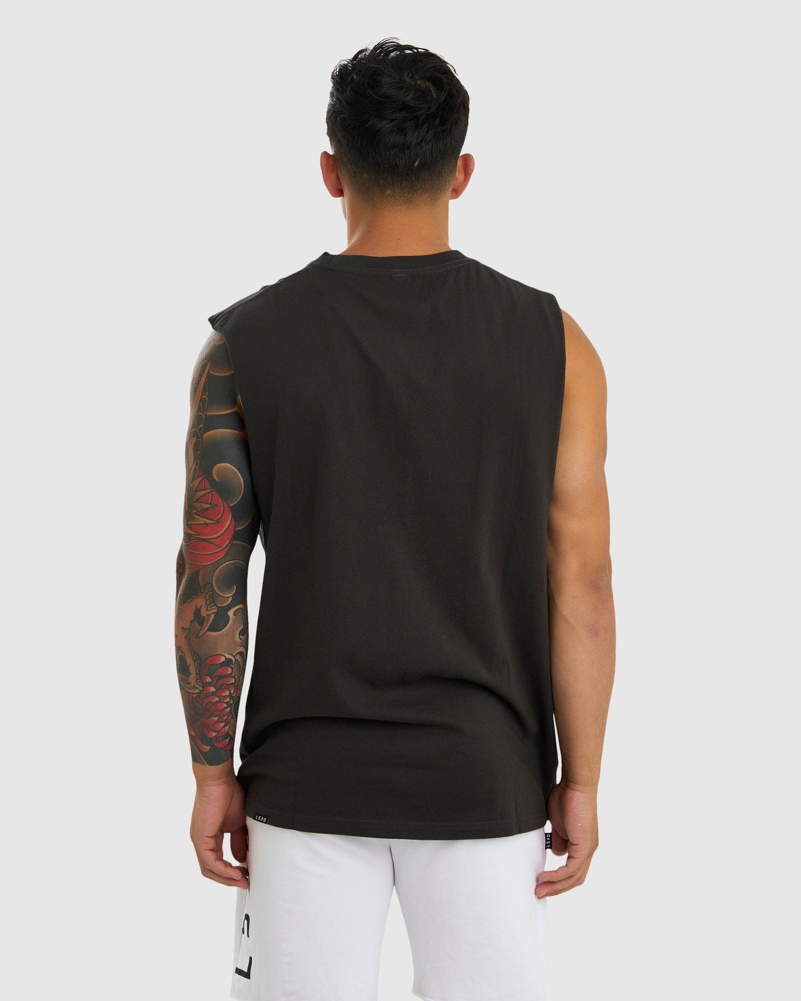 Model wearing Merch Tank Vintage Fit - Pirate Black