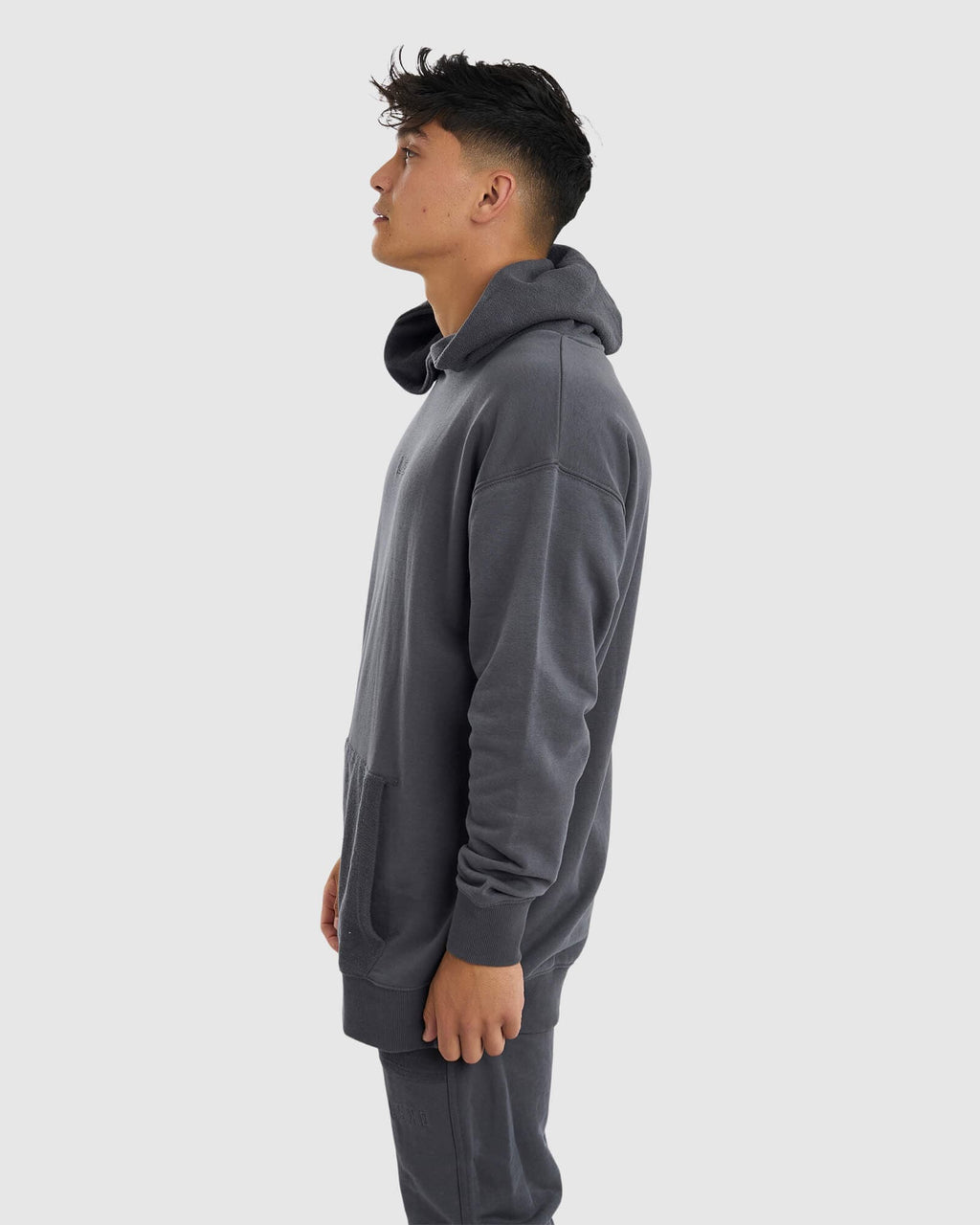 Model wearing Unisex Locker Room Hoodie Oversize - Iron