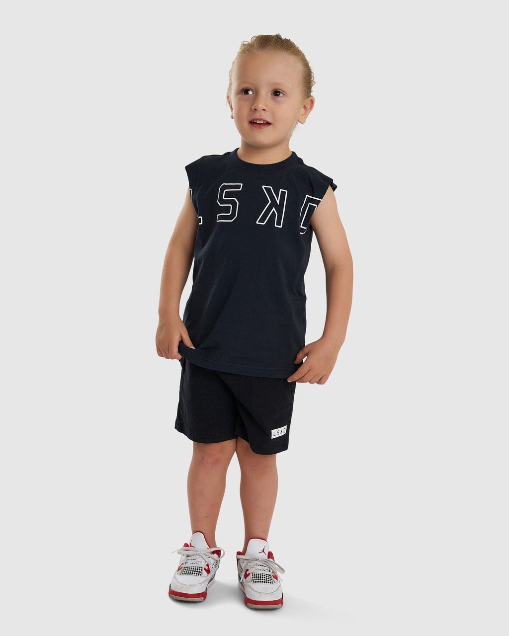 Model wearing Expand Tank (00-8) - Carbon