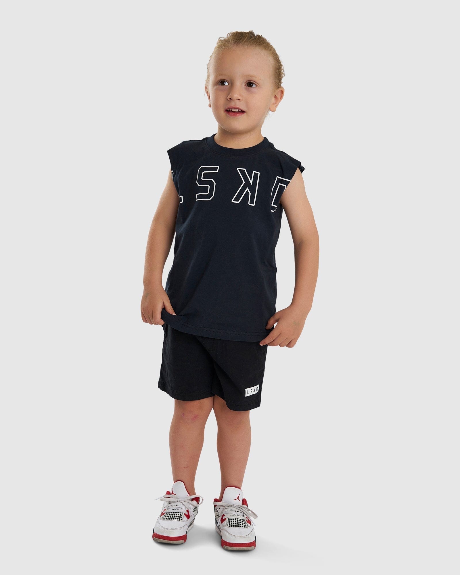 Model wearing Expand Tank (00-8) - Carbon