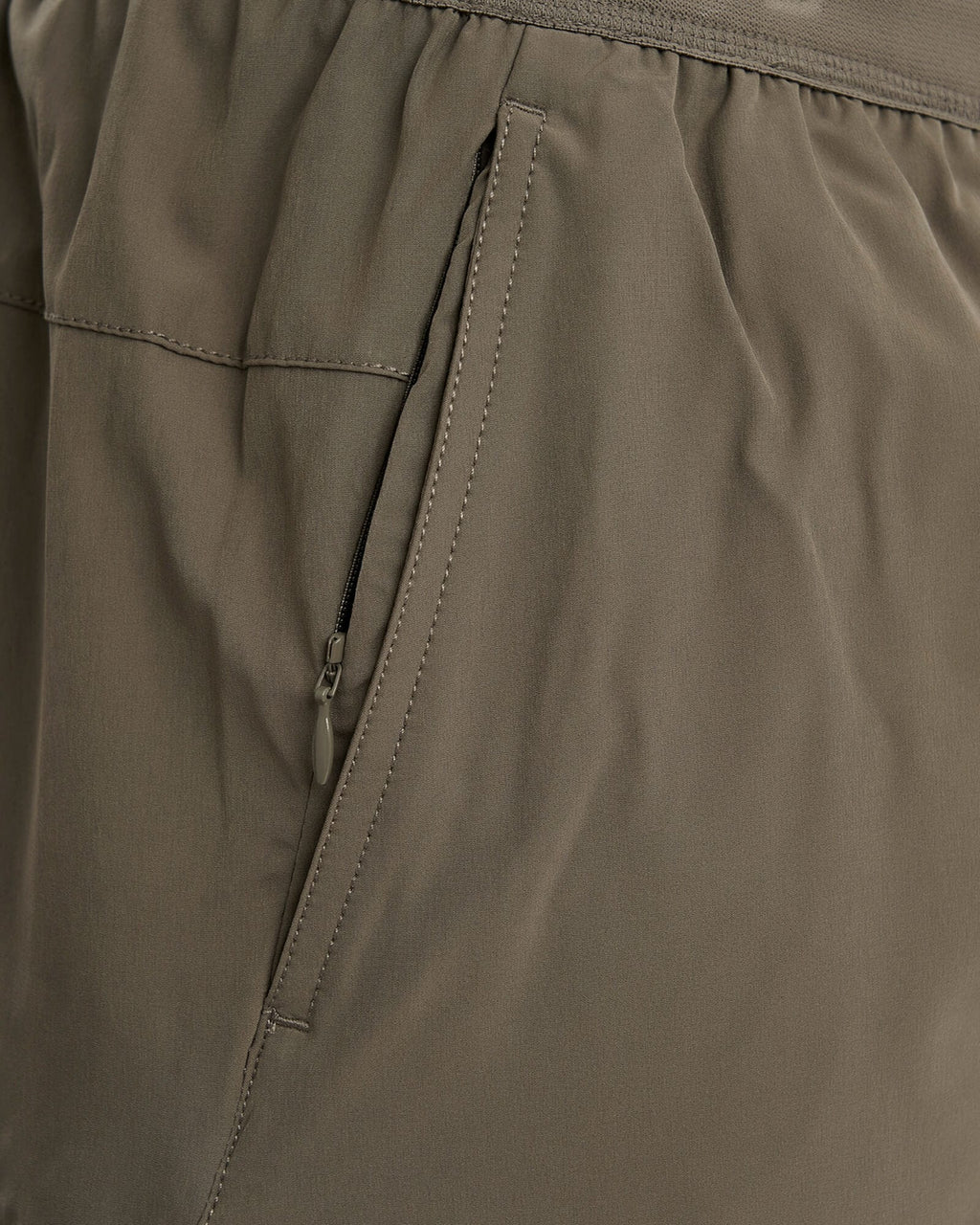 Model wearing Competition 8" Performance Short - Walnut Grey