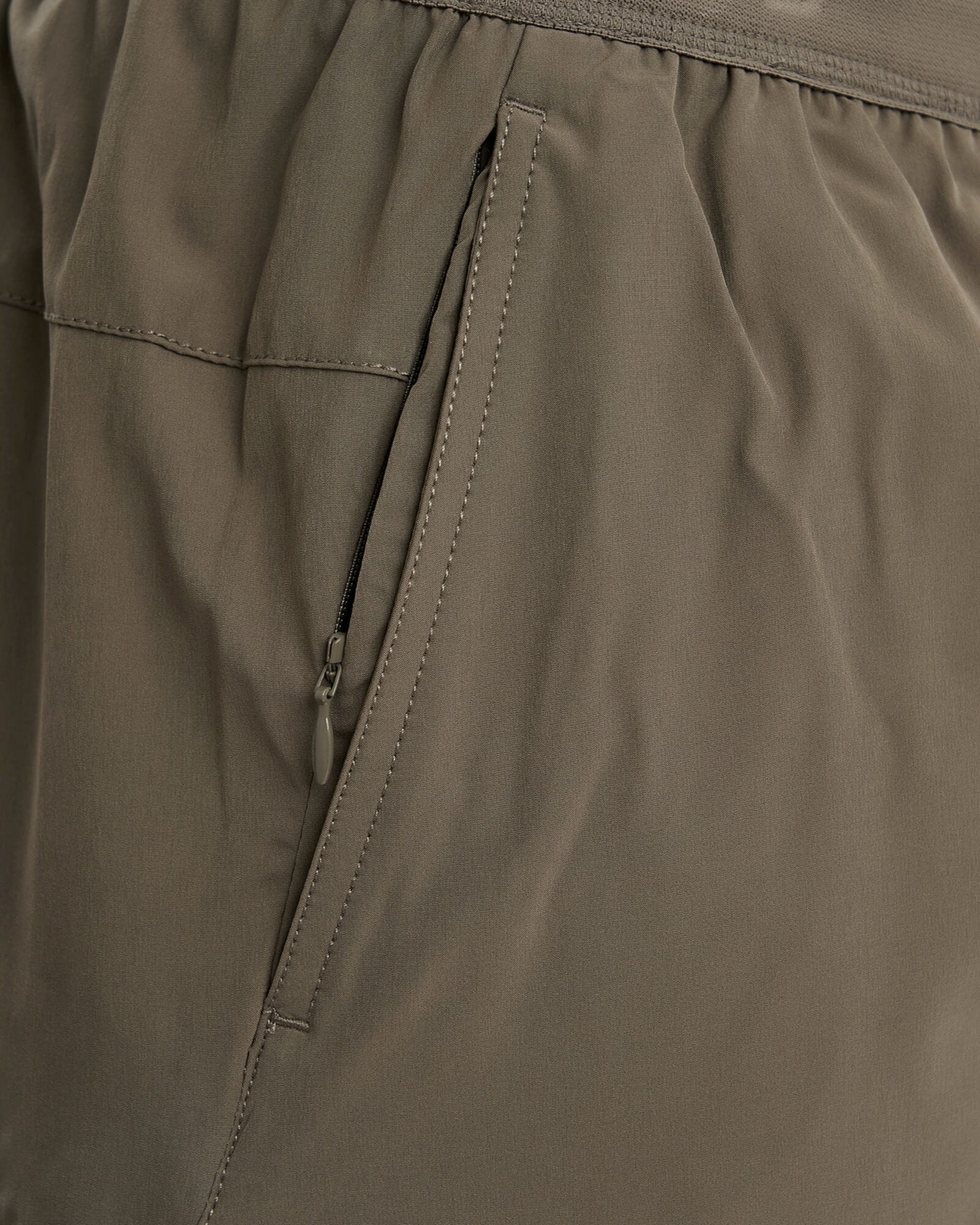 Model wearing Competition 8" Performance Short - Walnut Grey