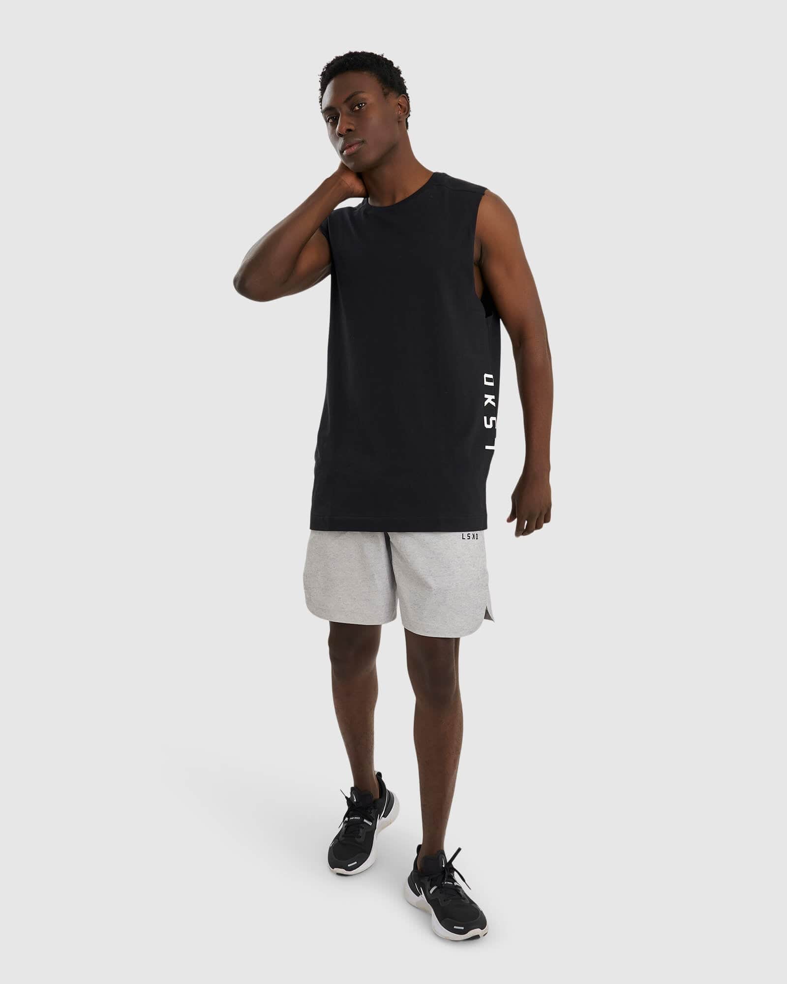 Model wearing Competition 8" Performance Short - Light Grey Marl