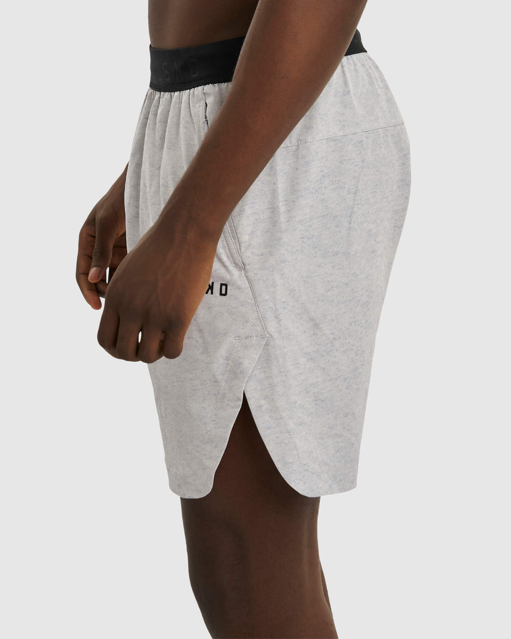 Model wearing Competition 8" Performance Short - Light Grey Marl