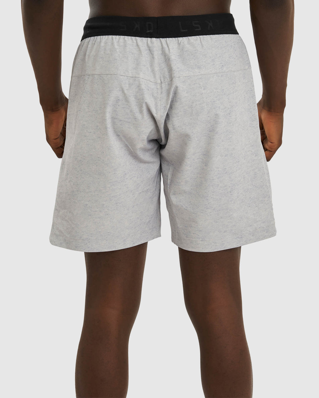 Model wearing Competition 8" Performance Short - Light Grey Marl
