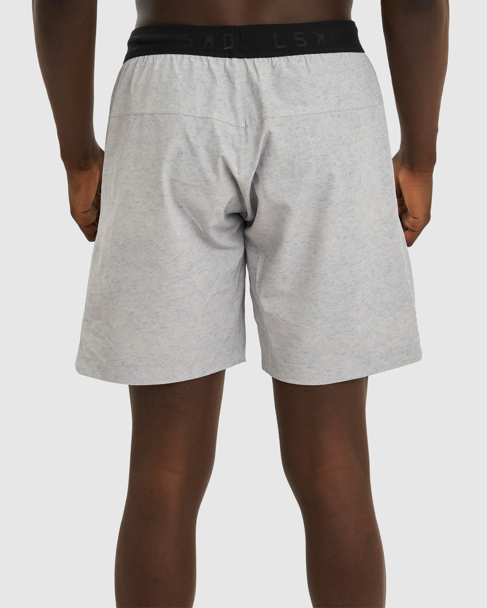 Model wearing Competition 8" Performance Short - Light Grey Marl