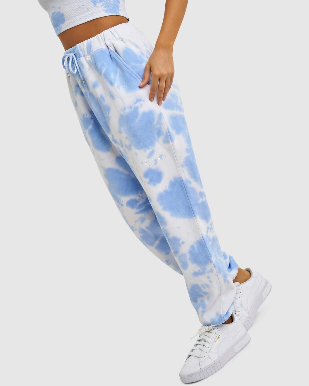 Model wearing Fast Track Pant - Soft Blue Tie Dye
