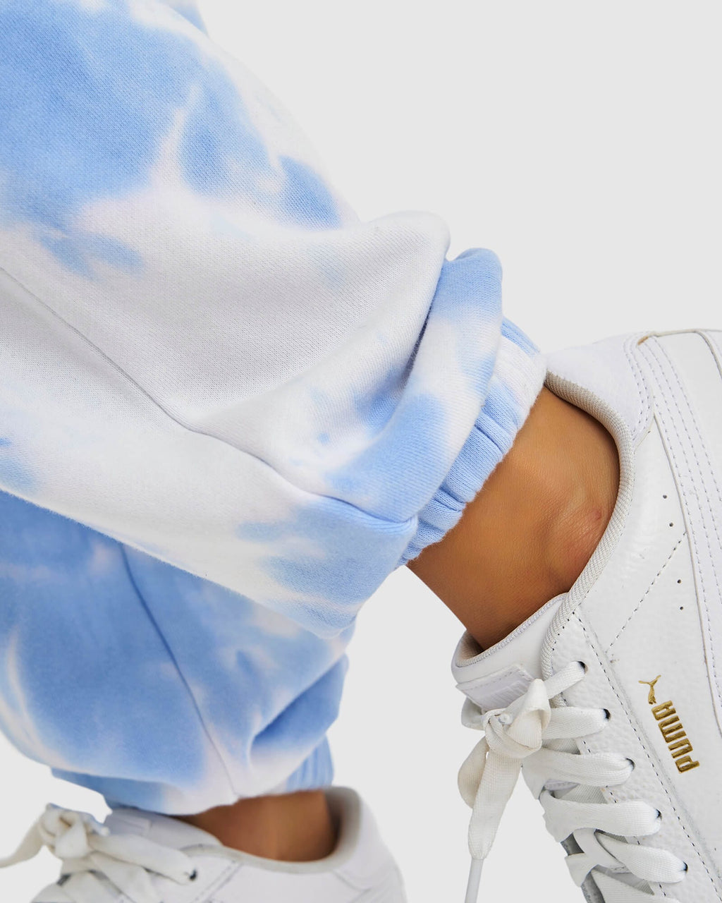 Model wearing Fast Track Pant - Soft Blue Tie Dye