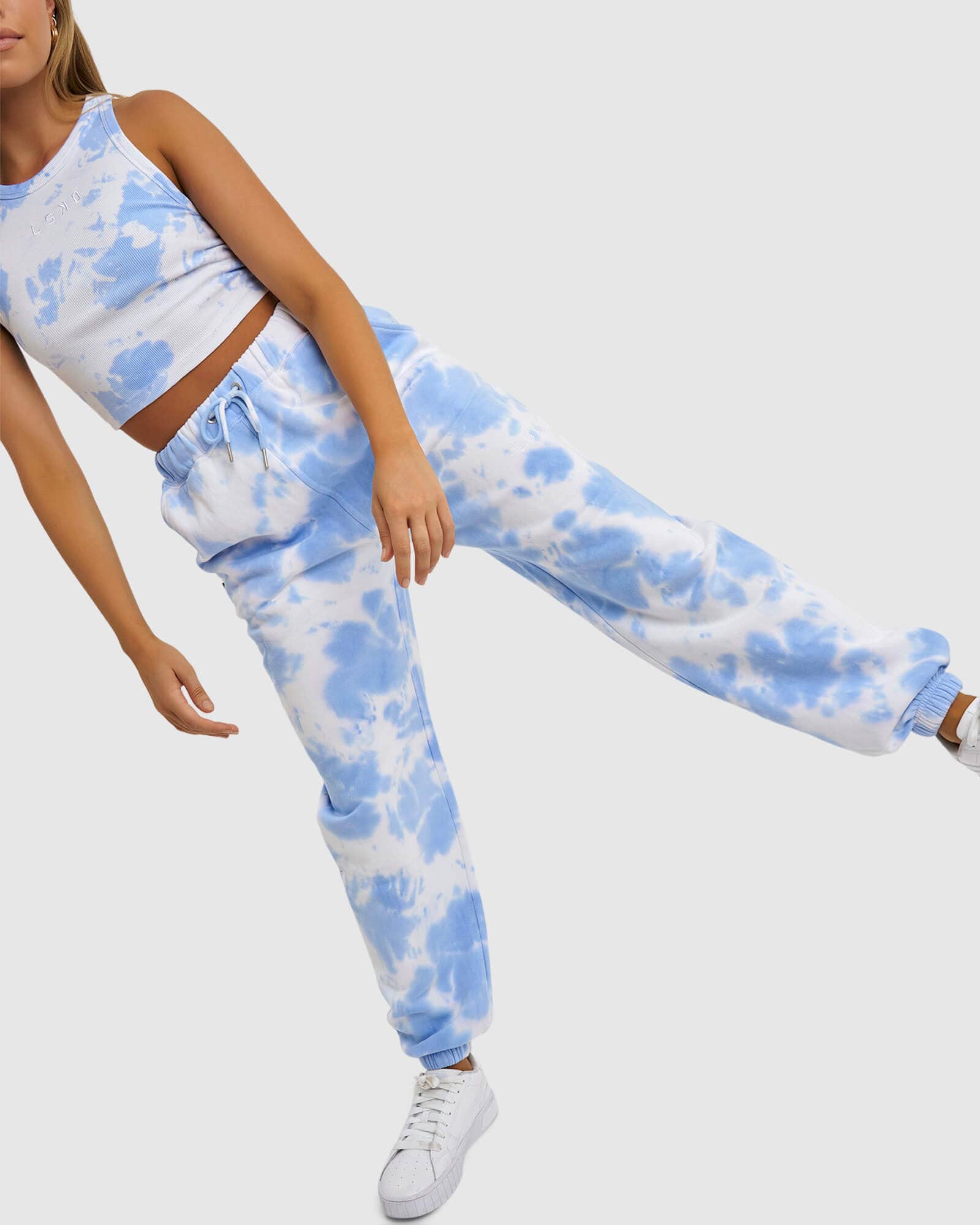 Model wearing Fast Track Pant - Soft Blue Tie Dye
