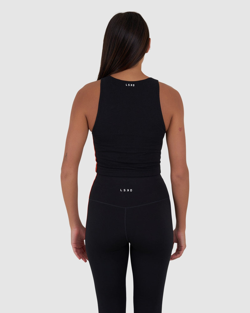 Model wearing Fitstop Warm Up Tank - Black