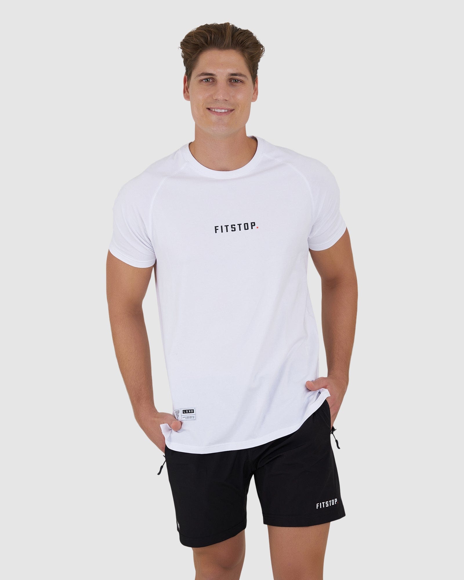 Model wearing Fitstop Optimal Tee - White
